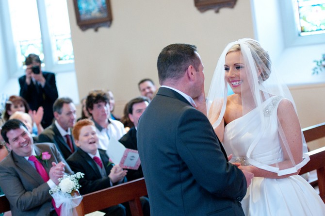 bride and groom exchange vows